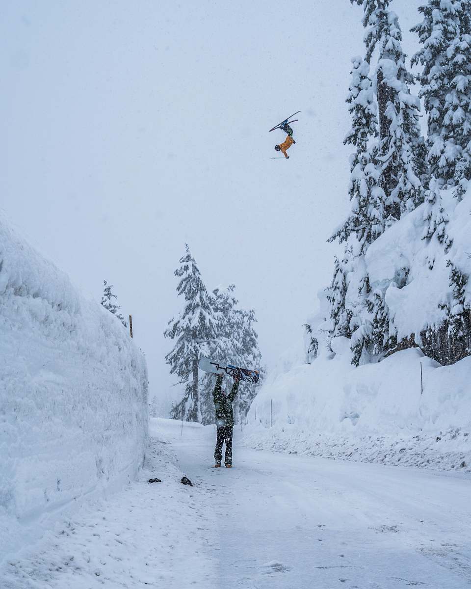 mt. baker ski area business office man holding snowboard in snow field bellingham